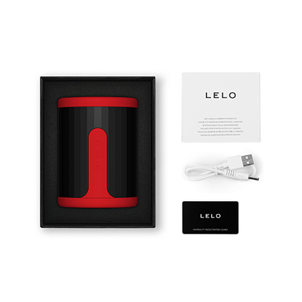 Contenido de la caja de LELO F2S con copa masturbadora, cable de carga y accesorios incluidos