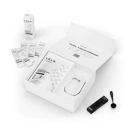 Suplemento sexual femenino LELO LABS Female Wellbeing Powder con sobres individuales y accesorios