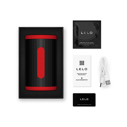 Contenido de la caja del succionador masculino LELO F2S Double Sonic con funda, documentación y cable USB.
